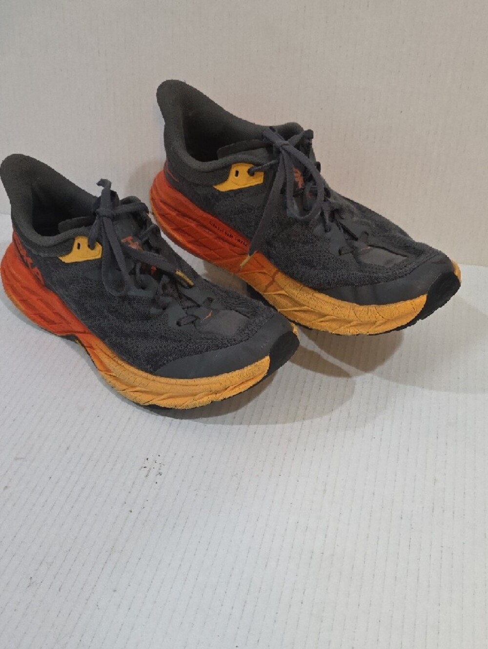Hoka SpeedGoat 5 Men's Dark Gray Running Shoes with Orange and Yellow Size 10.5 - Picture 2 of 11